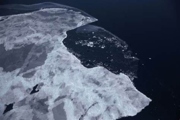 Sea levels rising and Arctic ice at a record low, global report says